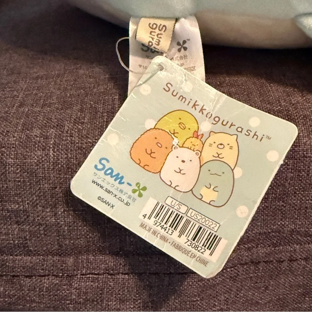 Sumikkogurashi Tokage plush toy.